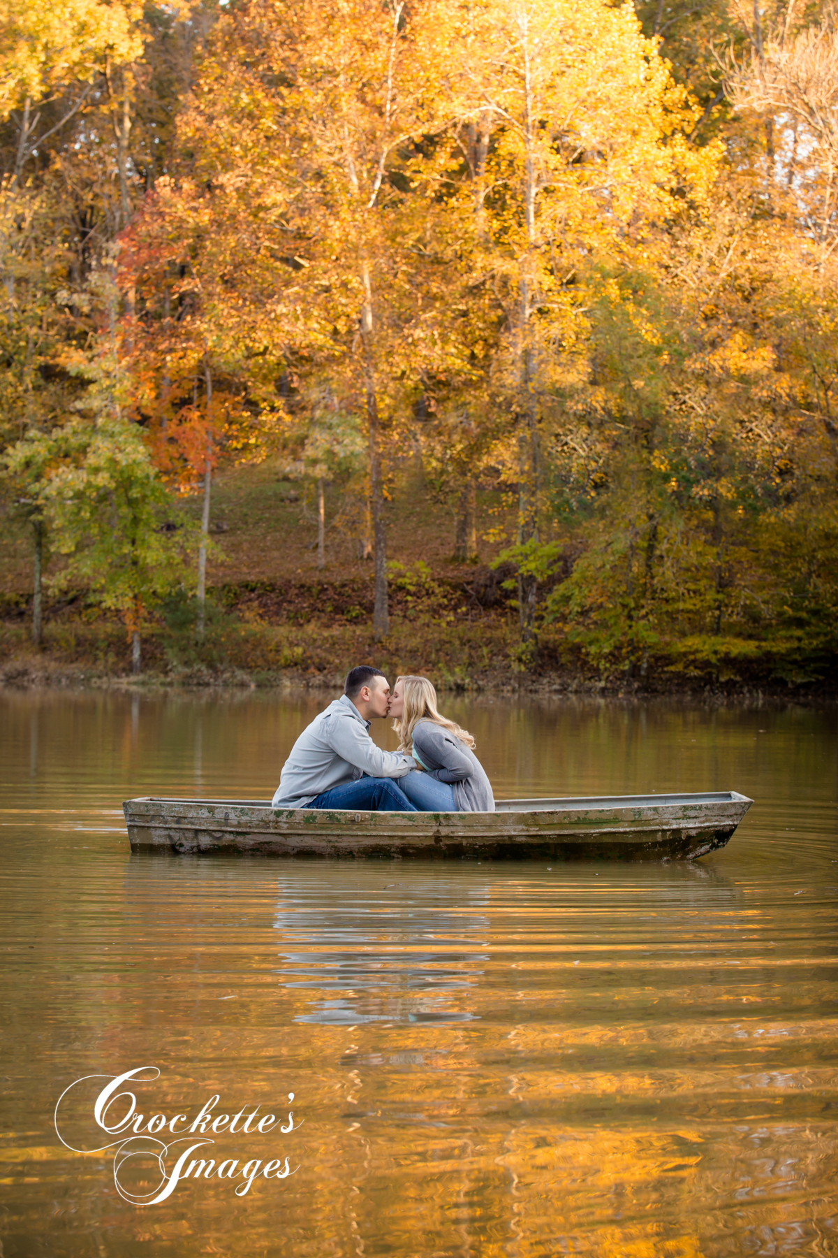 engagement photo with couple in boat 