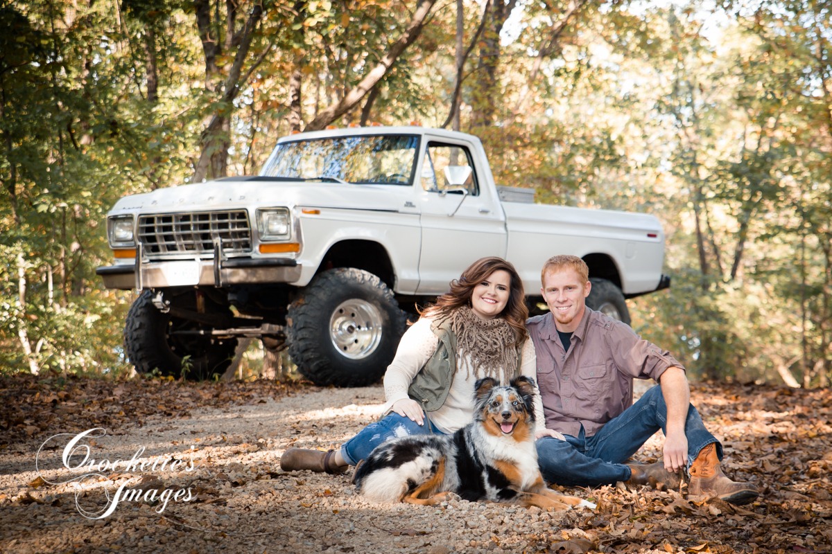 fall engagement photo with a dog and truck