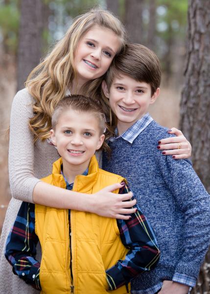 Winter Family Photo in the pine trees