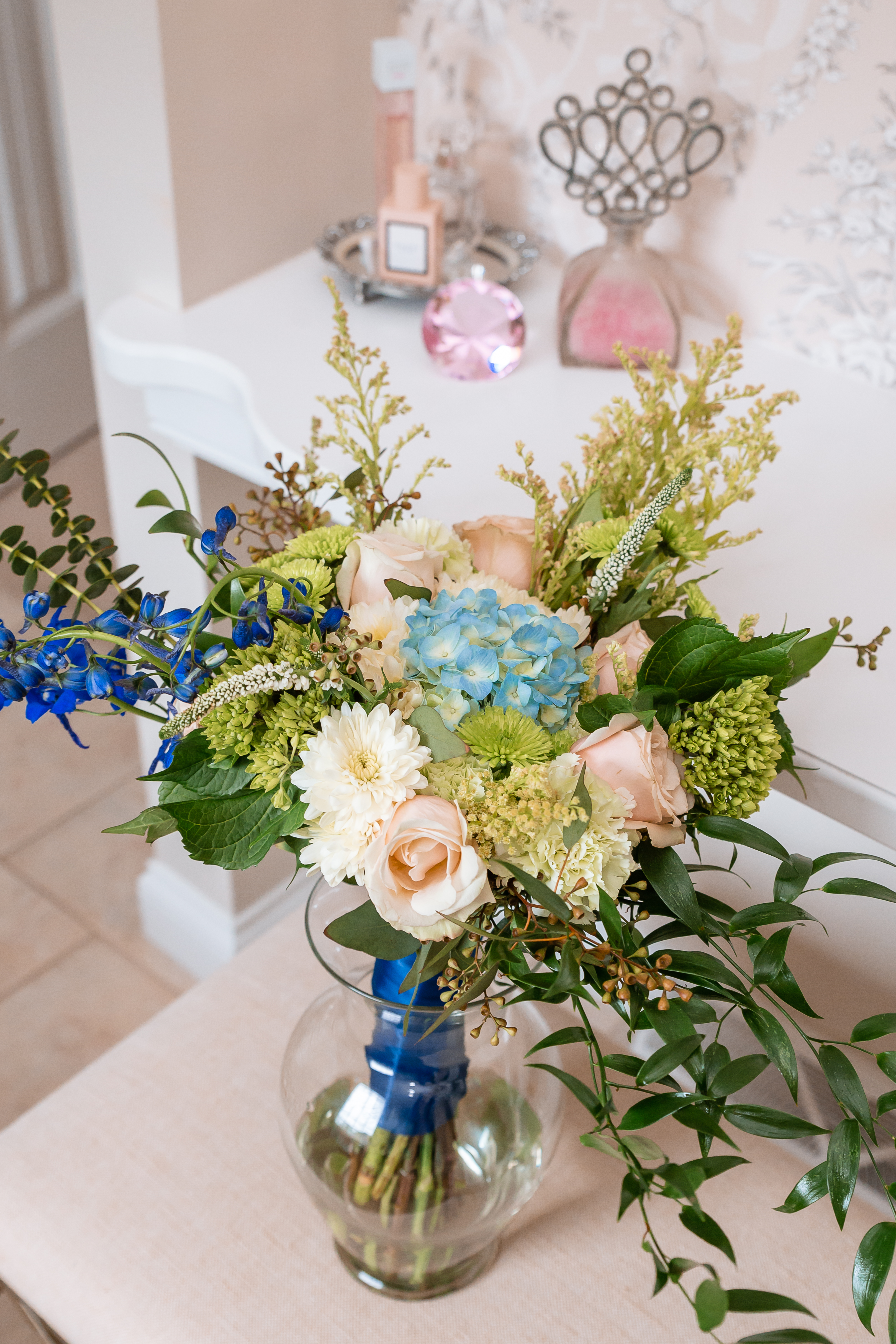 Wedding Detail Photos, Flowers on the wedding day, Blue hydrangeas, pink roses, and spring wedding bouquet.