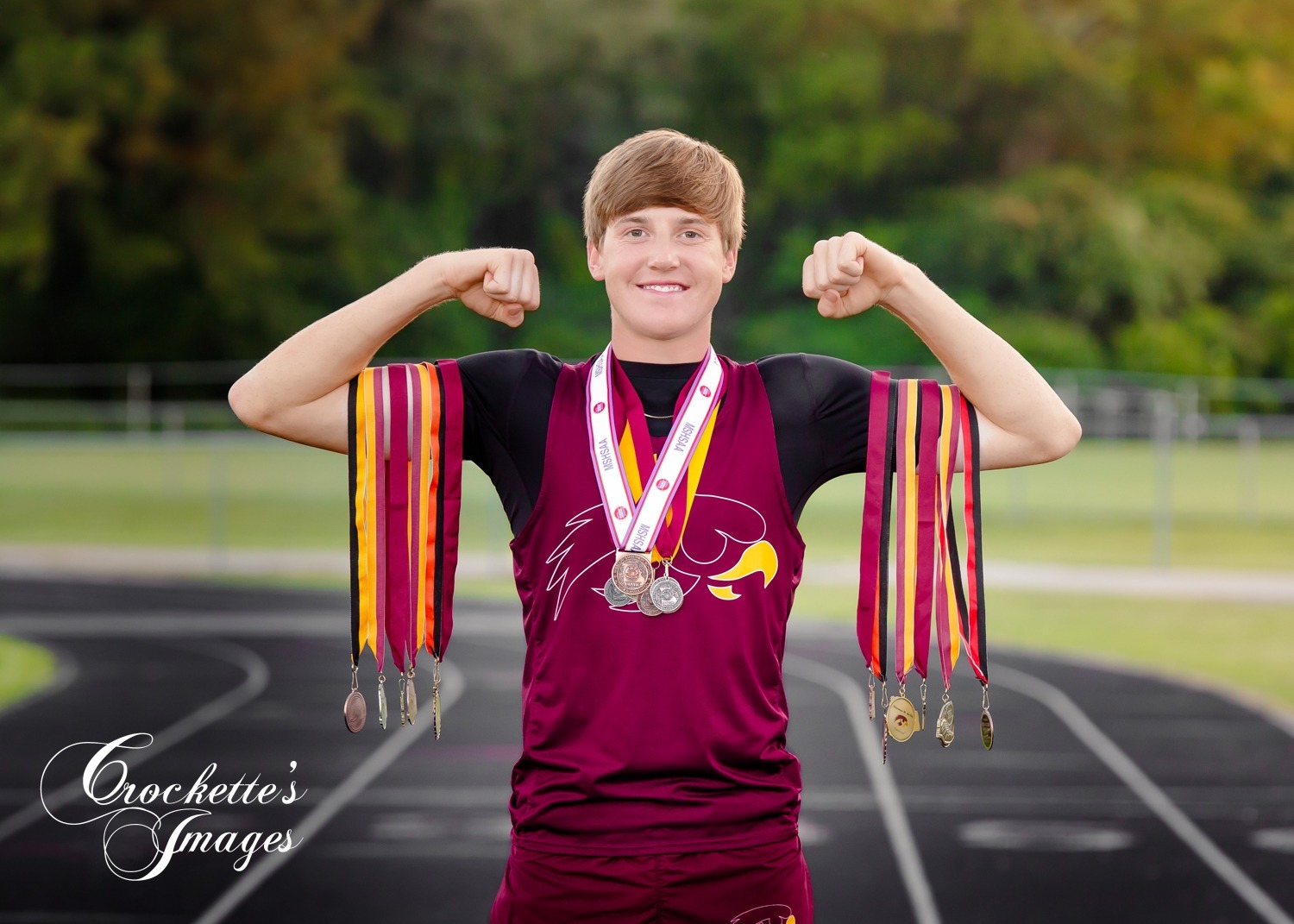 Creative Track, Running, Sports Senior Photos with medals. Kelly High School Senior