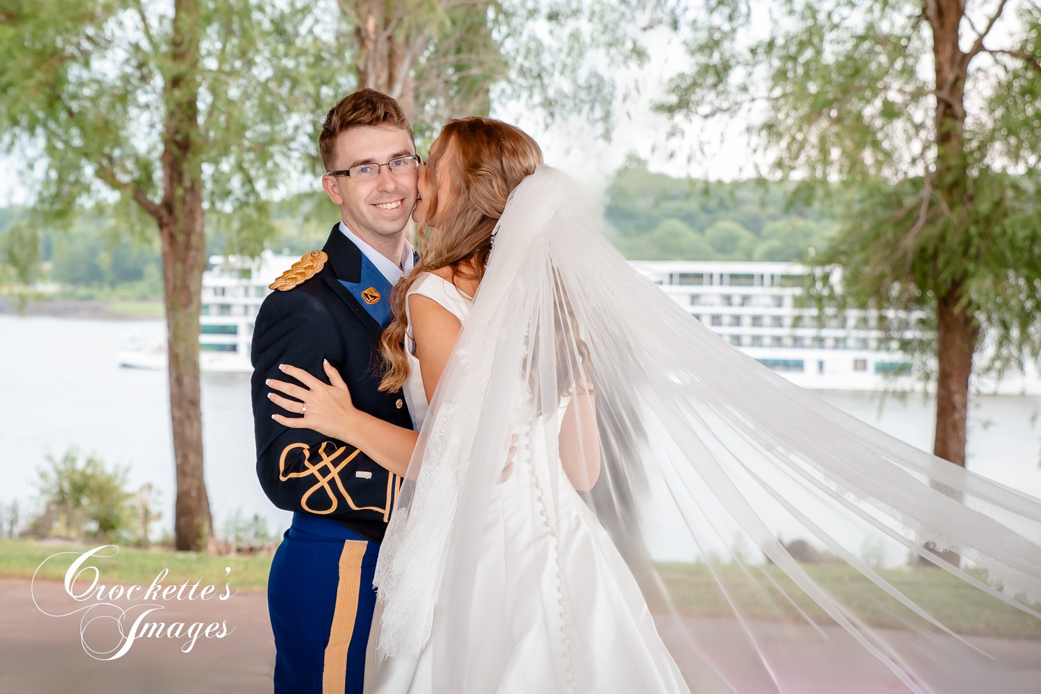Wedding Photos at Amor on The River in Scott City, MO. Long veil wedding photos