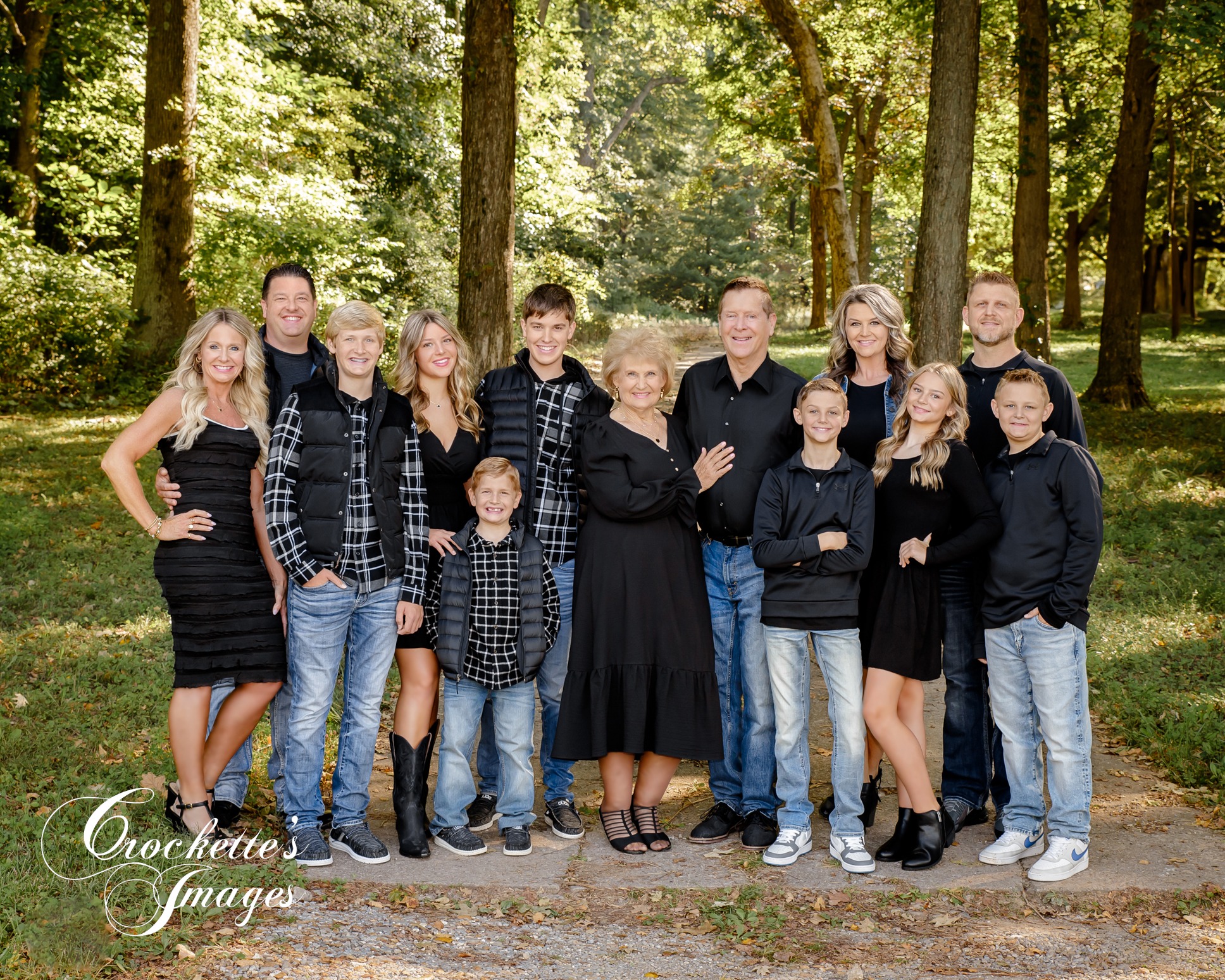 Classy, Elegant, Extended Family Photo with black clothing color scheme. Large Family Photo
