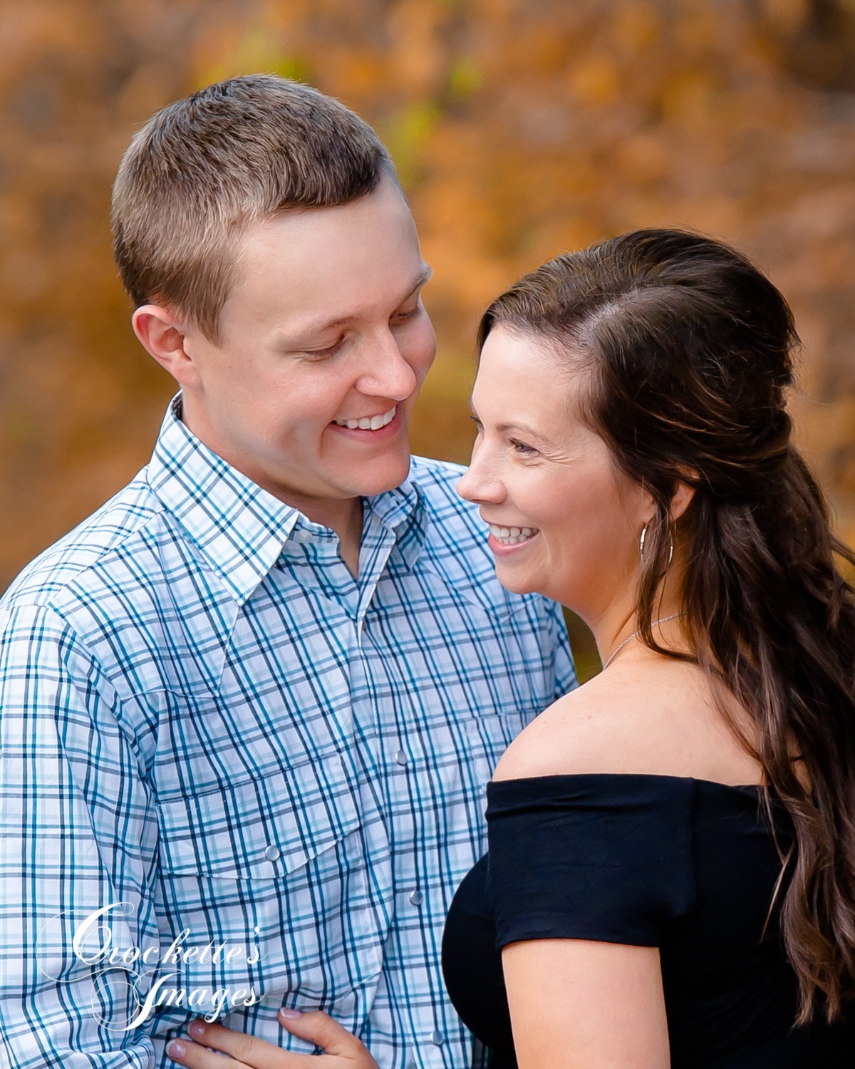Fun, Candid, Emotional Fall Country Engagement Photos in Cape Girardeau, MO. Black and light blue clothing color scheme