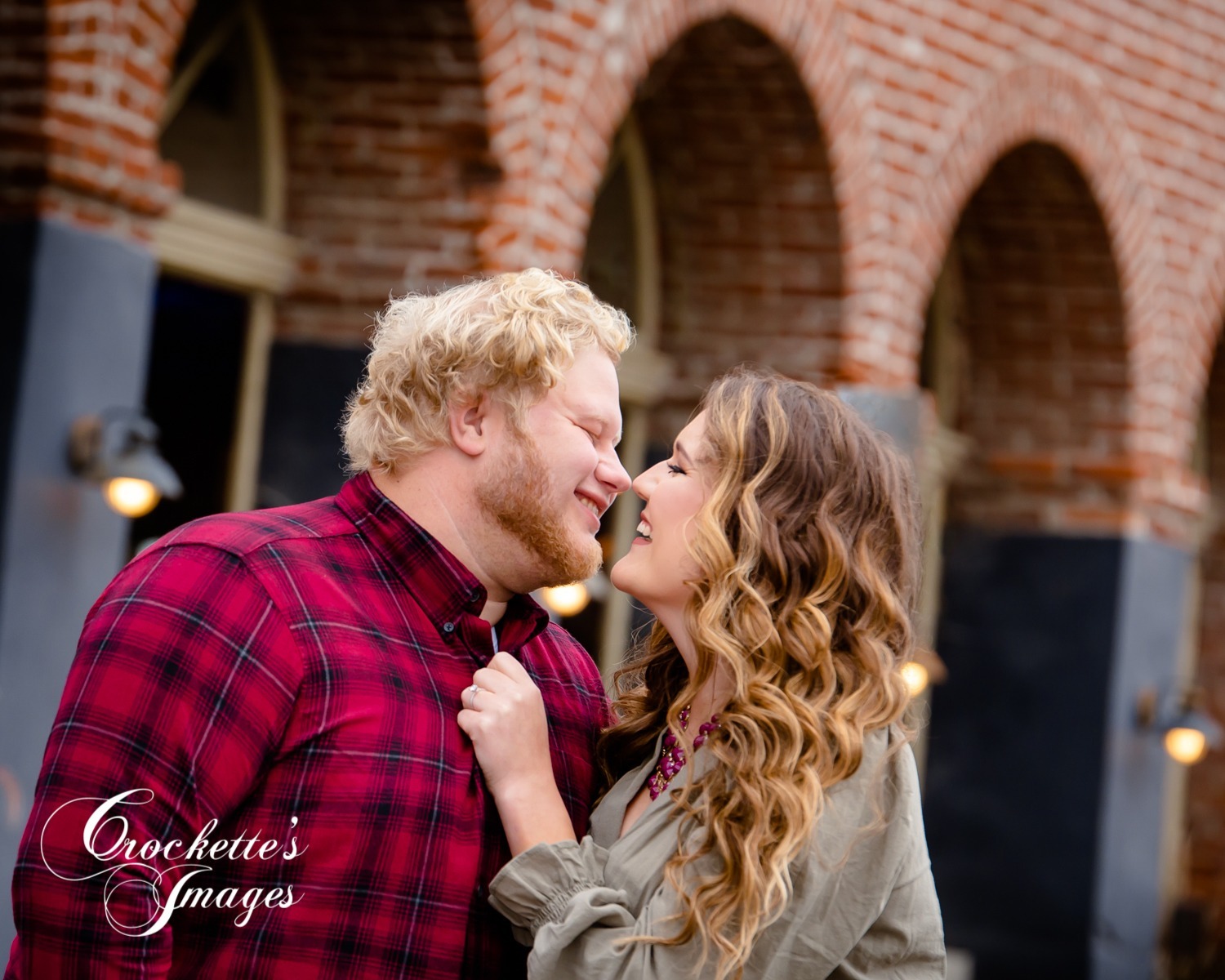 fun and emotional Engagement Photos Downtown Cape Girardeau, MO