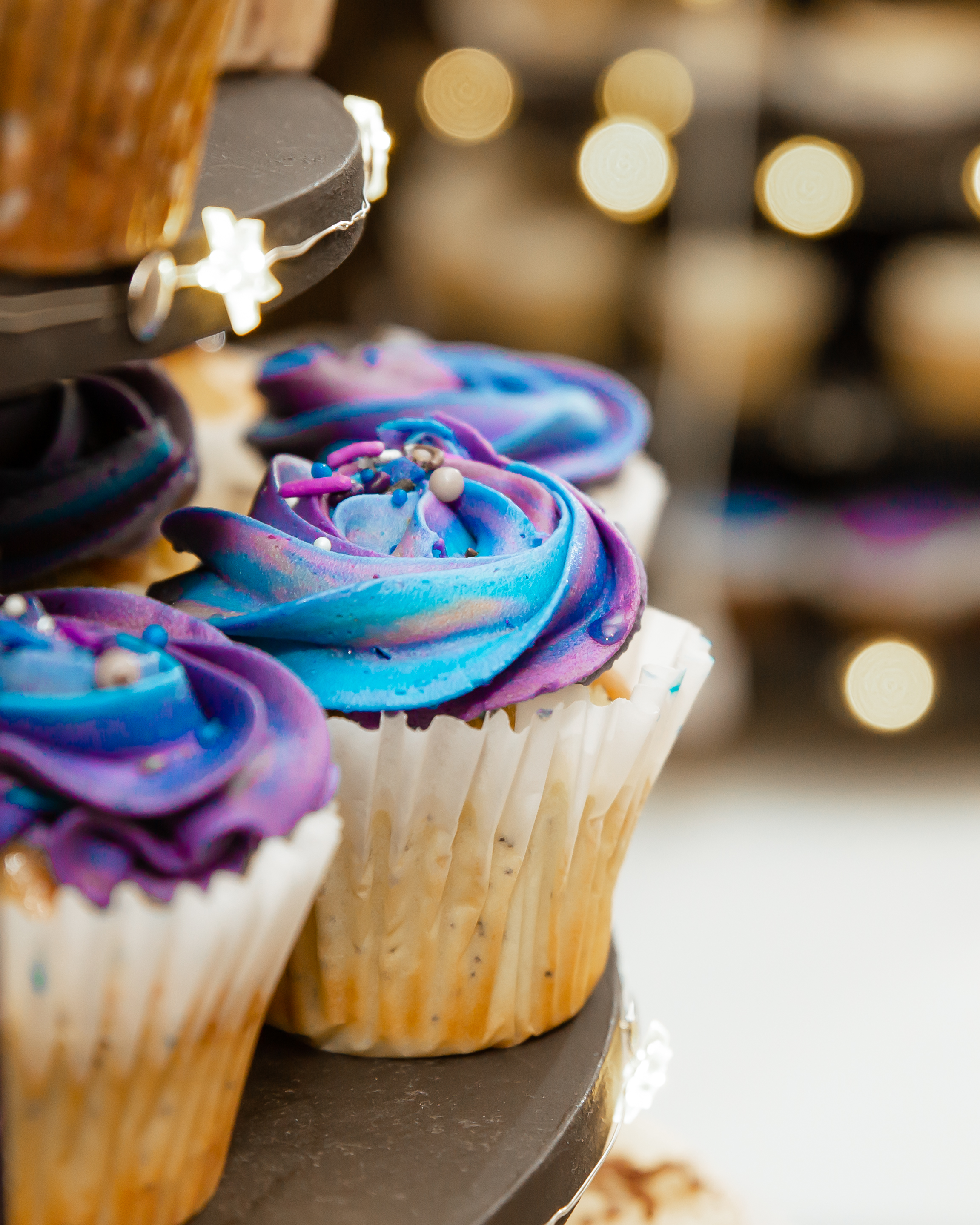 Purple an Blue Cupcakes at a wedding reception
