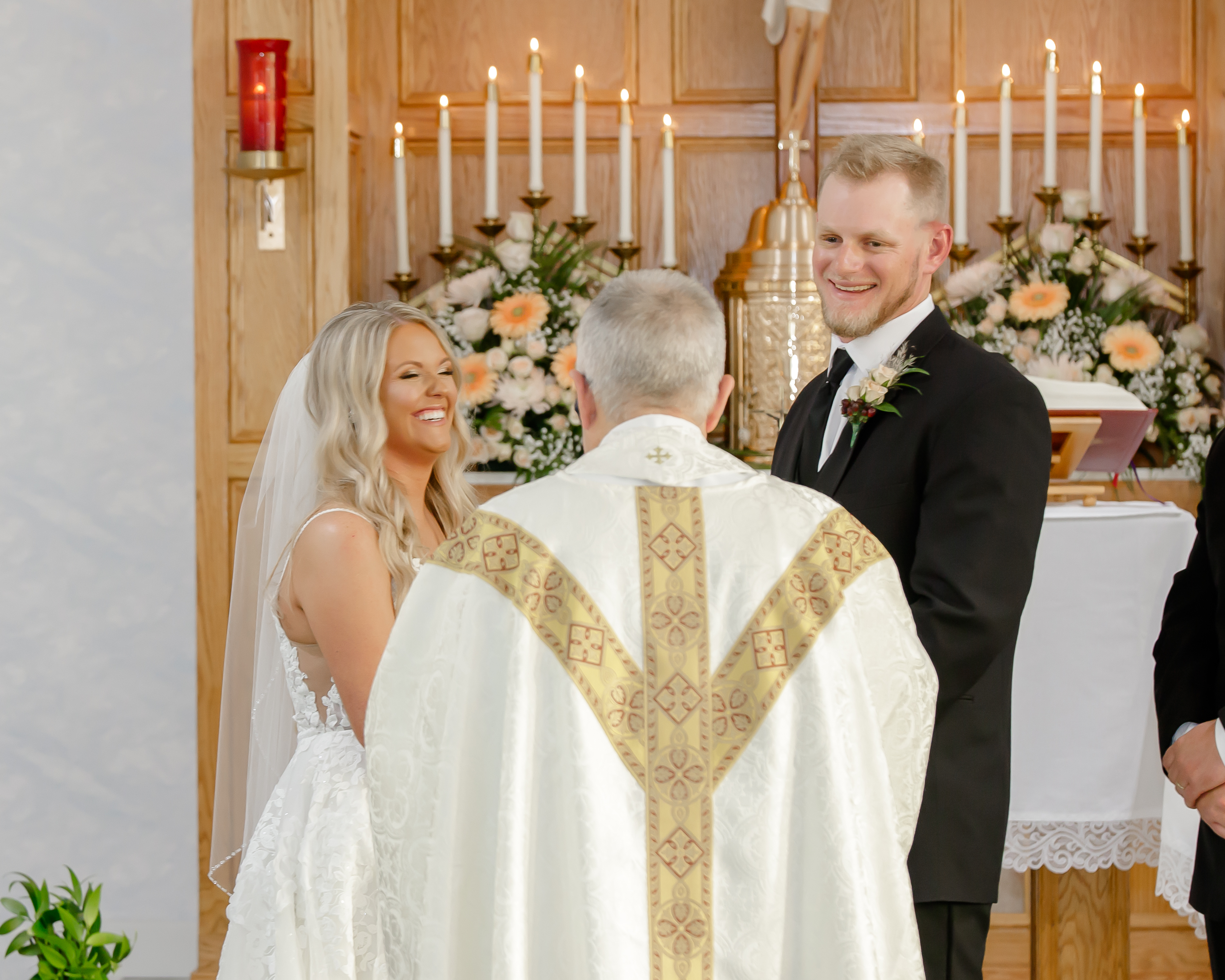 Couple laughing at a Catholic Wedding Ceremony