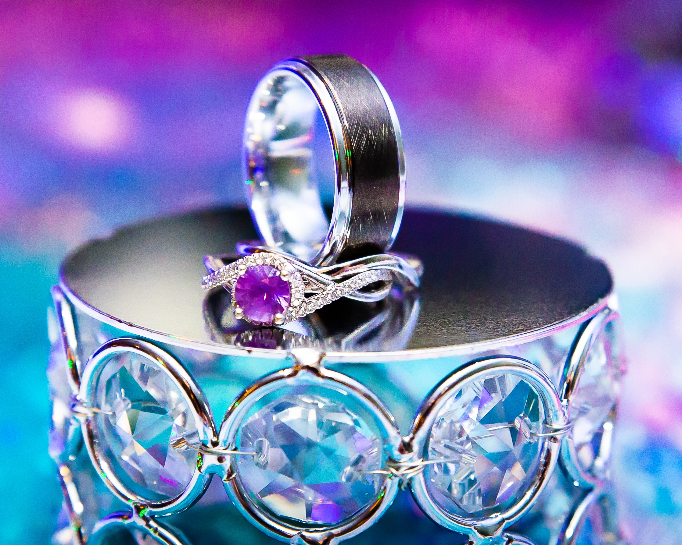 Purple an Blue photo of wedding rings