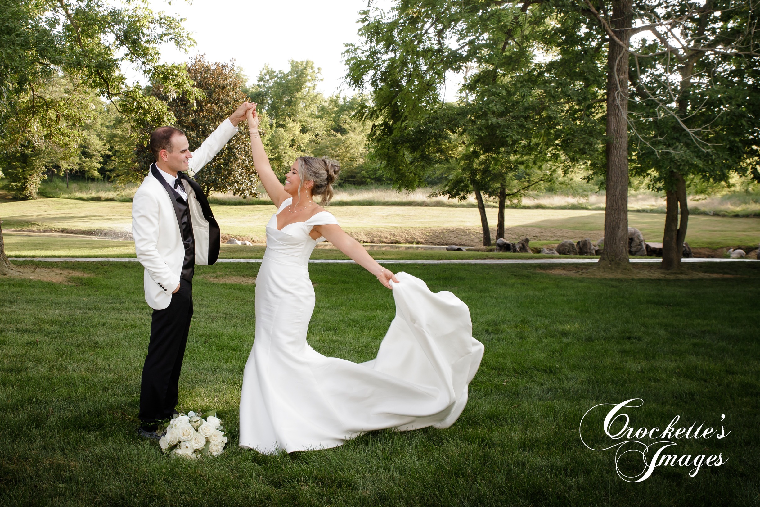 Bride & Groom dancing by pond at Rusted Route