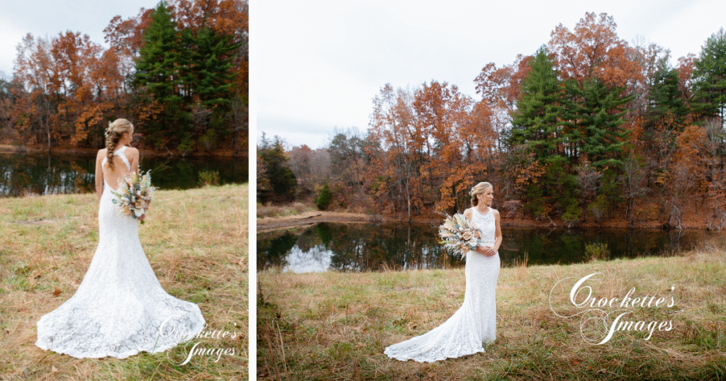 How to Pose With Your Bridal Bouquet for Timeless Wedding Photos You’ll Love Forever 13 Bride posing with her bouquet in front of a pond with fall trees in the background.