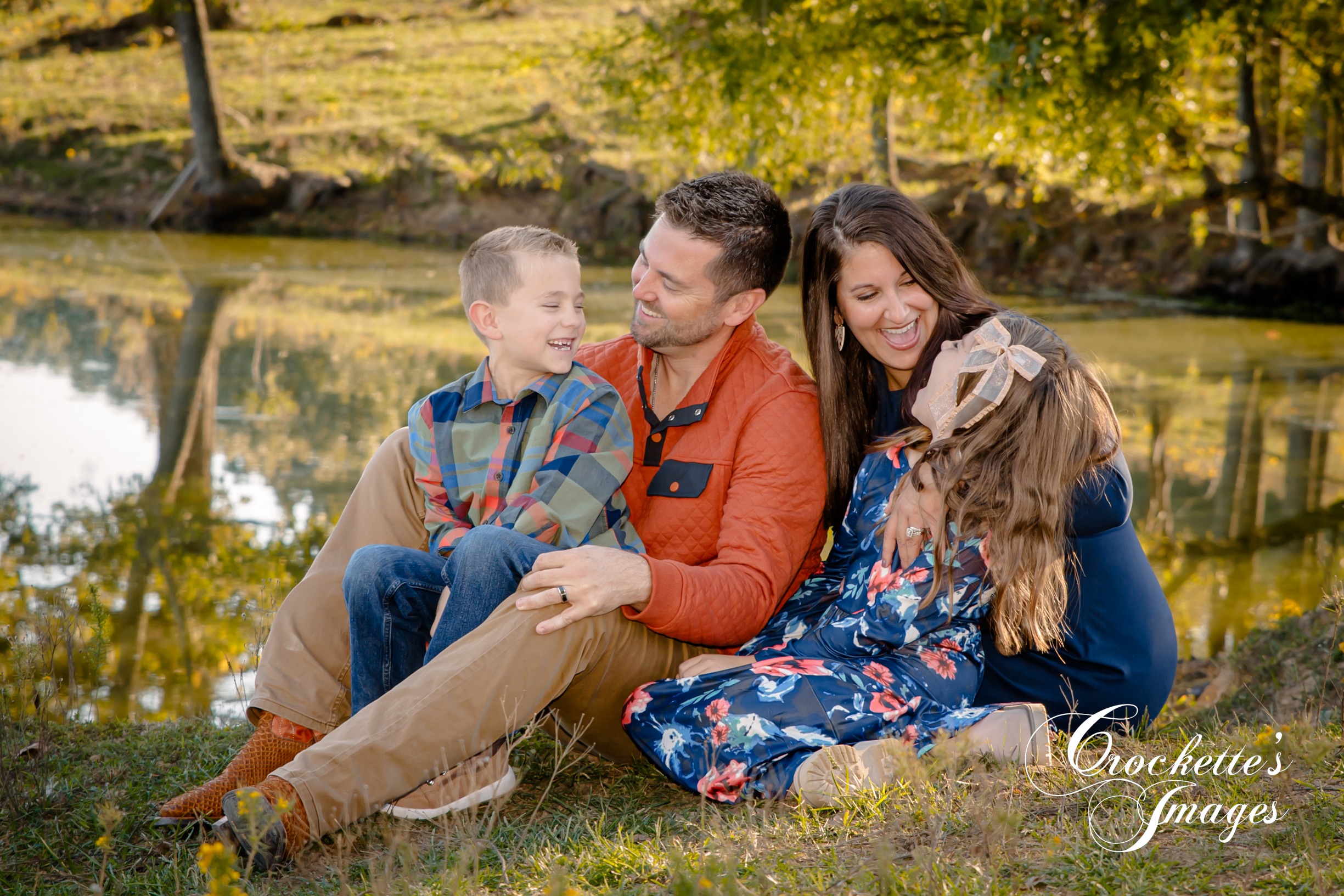 Family Photography 8 Family photo by a lake in the fall. family is laughing together