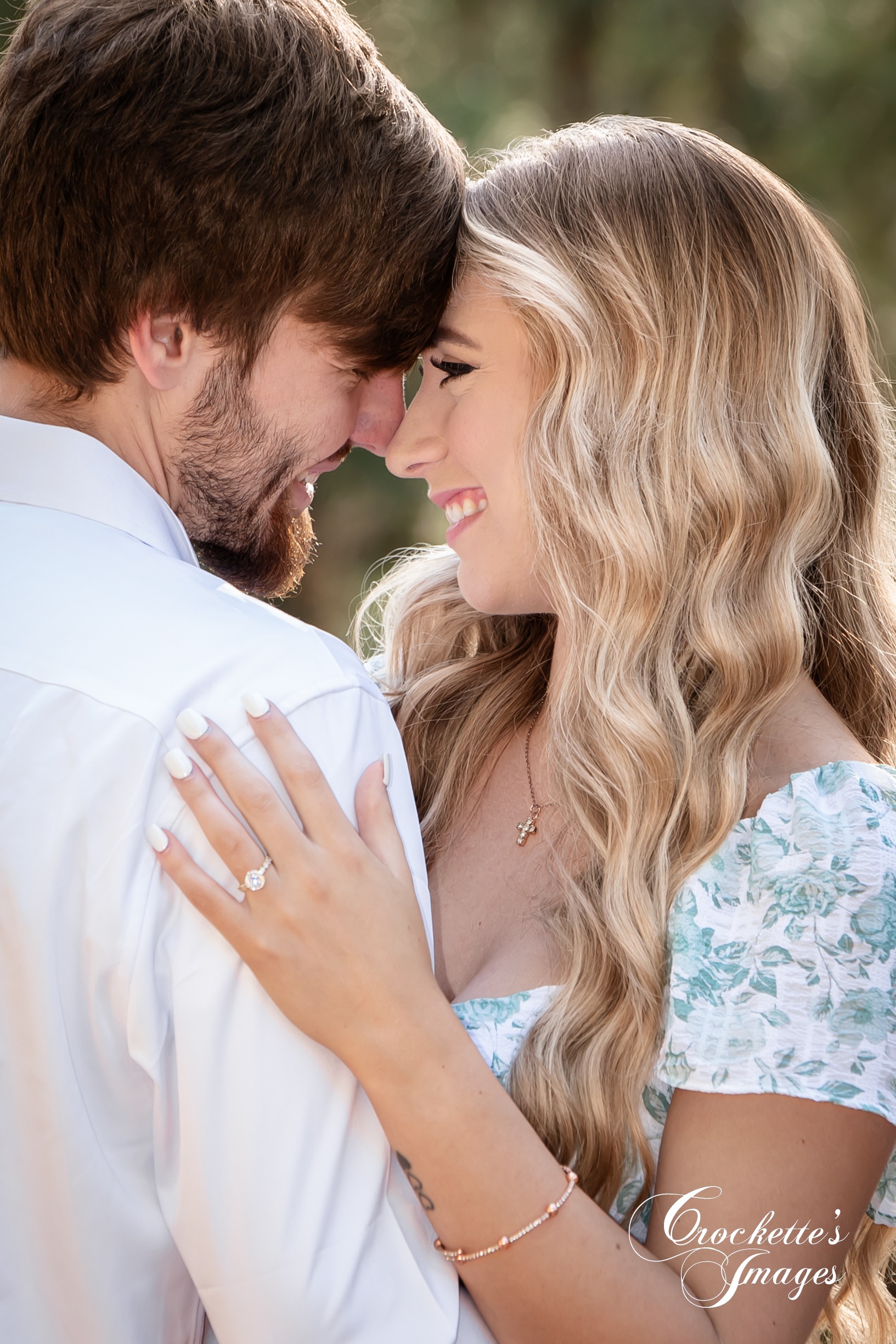 Engagement photo with Crockette's Images in the pine tree forest