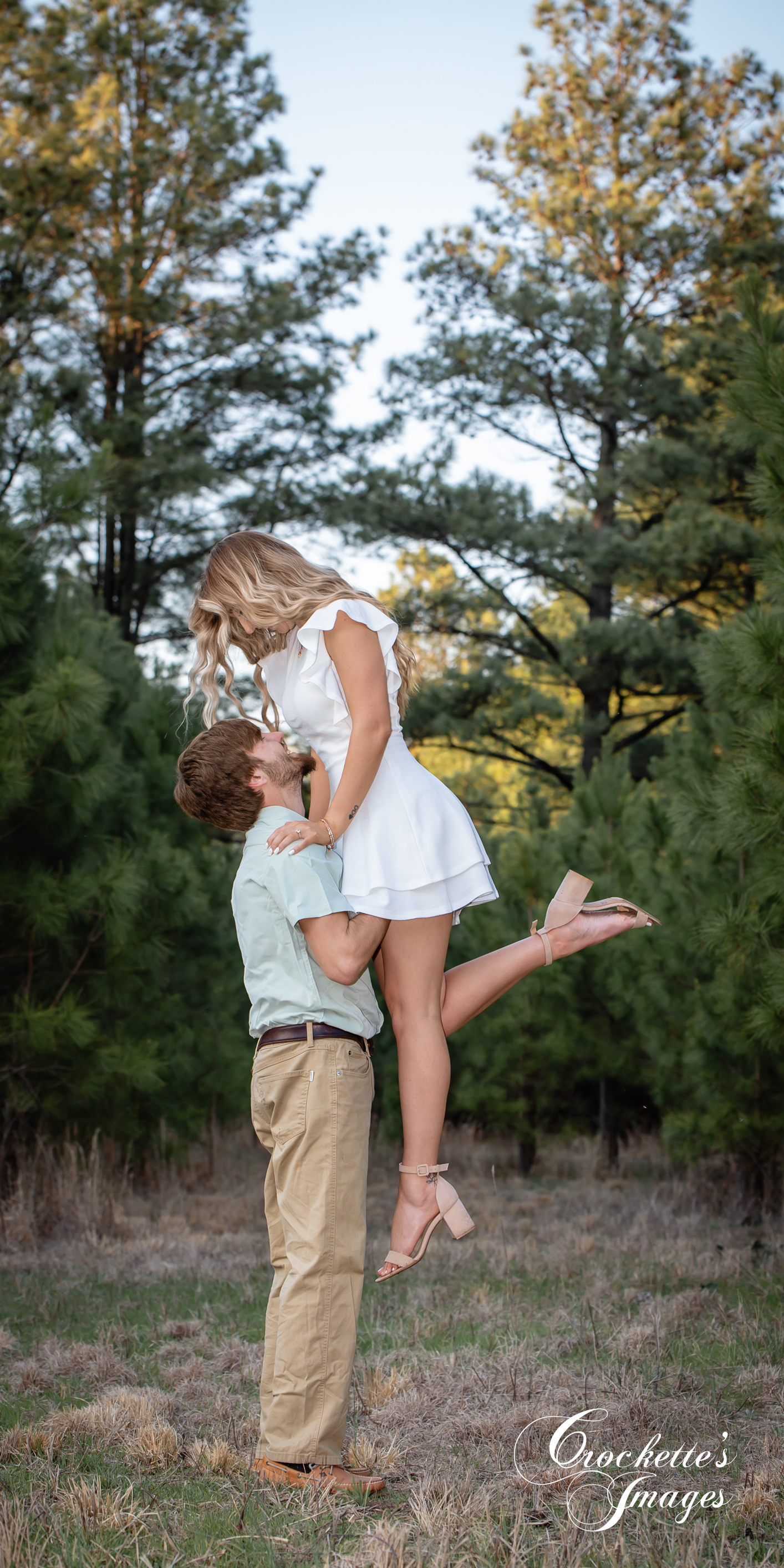 Engagement photo with Crockette's Images in the pine tree forest