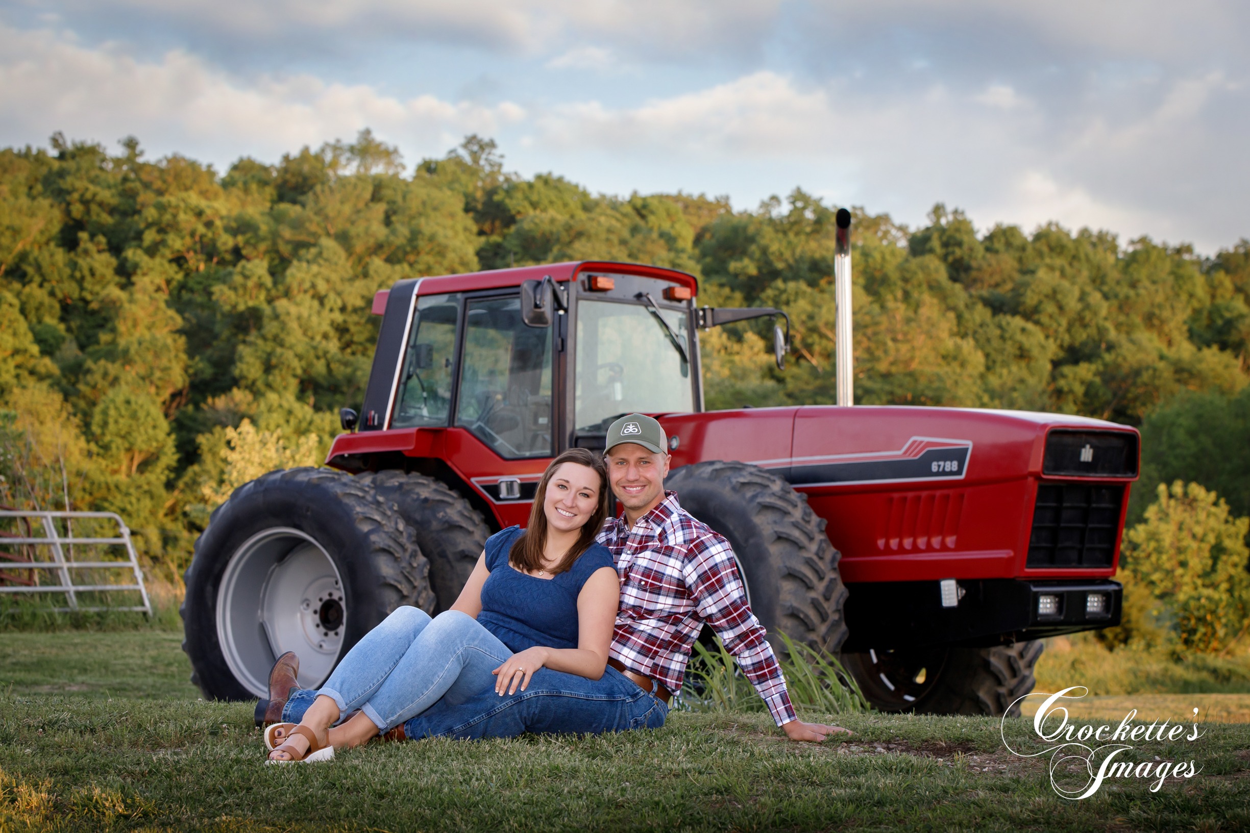 Country engagement photo with Crockette's Images with a red International Harvester Tractor at sunset